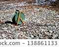 Orange and green  power extension cable reel at the construction site 138861133