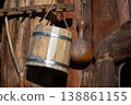 Rustic wooden bucket with metal bands 138861155