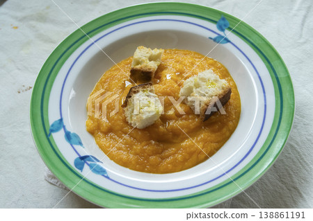 Pumpkin cream soup with crunchy bread croutons Pumpkin cream soup with crunchy bread croutons 138861191