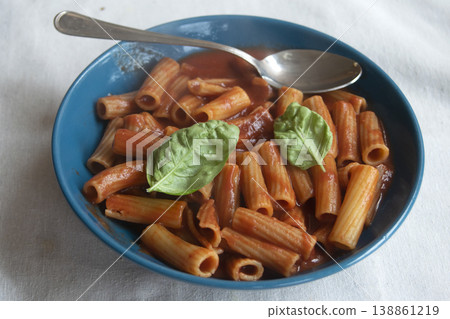 Italian rigatoni pasta with tomato sauce 138861219