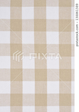 Beige and white checkered fabric texture 138861389