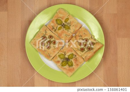 Artistic Focaccia with Leek Capers and Stuffed Olives Artistic Focaccia with Leek Capers and Stuffed Olives 138861401