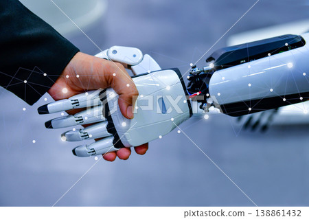 Robot and human handshake representing artificial intelligence collaboration and future technology. 138861432