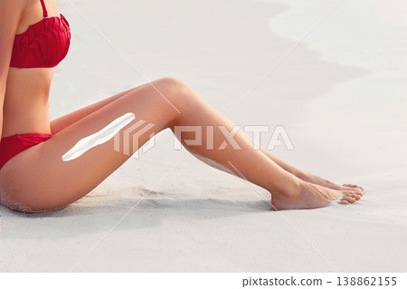 Sexy Suntan Bikin Woman Legs Relaxing Lying Down near Beach.  Beauty Skincare. Protection Sun. Epilation Laser or Shaving Concept.Sunscreen on Feet 138862155