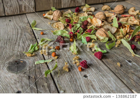 Dried delicious delicacies. Dry pieces snack on a wooden background Dried delicious delicacies. Dry pieces snack on a wooden background 138862187