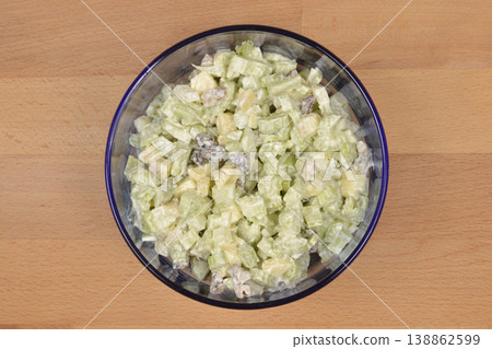 Waldorf Salad in a Blue Bowl on Wooden Table Waldorf Salad in a Blue Bowl on Wooden Table 138862599