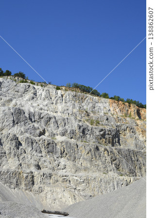 Stone Quarry Pit with Steep Rocky Walls Stone Quarry Pit with Steep Rocky Walls 138862607