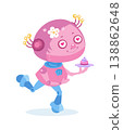 Cute pink girl robot holding cupcake vector illustration isolated on white background. Friendly female android character with flowers on head carrying sweet dessert on plate. 138862648