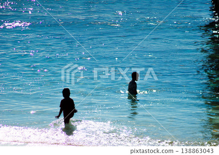 The beautiful aerial view of the morning on the beach with blue sea water in Kaur, Bengkulu, Indonesia The beautiful aerial view of the morning on the beach with blue sea water in Kaur, Bengkulu, Indonesia 138863043