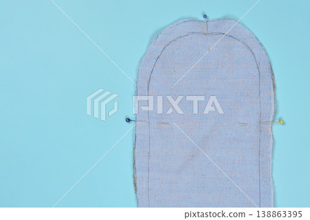 Blue Fabric Sewing Pattern with Pins Blue Fabric Sewing Pattern with Pins 138863395