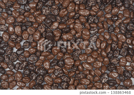 Chocolate Covered Raisins Background Chocolate Covered Raisins Background 138863468