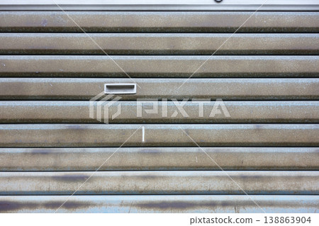 Details of an old steel shutter Details of an old steel shutter 138863904