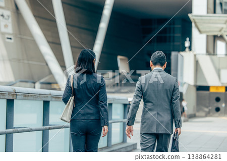 Senior businessmen (male and female) 138864281