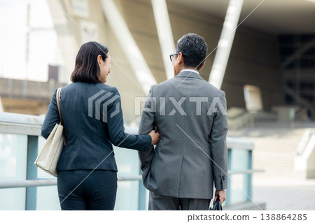 Senior businessmen (male and female) 138864285