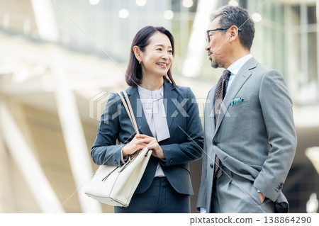 Senior businessmen (male and female) 138864290