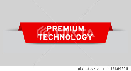 Red color inserted label with word premium technology on gray background 138864526