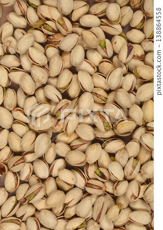Large group of roasted unsalted pistachios in shells Large group of roasted unsalted pistachios in shells 138864558