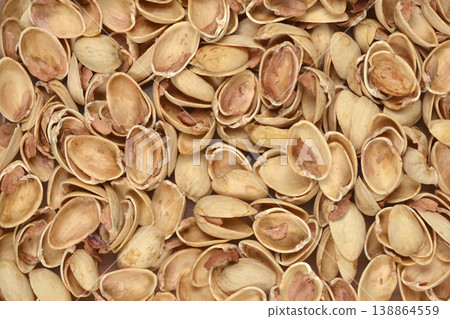 Empty pistachio shells texture background Empty pistachio shells texture background 138864559