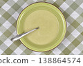 Creamy leek and celery soup in a green bowl 138864574
