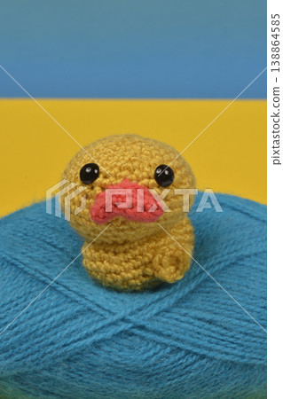 Handmade Yellow Crocheted Duckling on Blue Yarn Handmade Yellow Crocheted Duckling on Blue Yarn 138864585