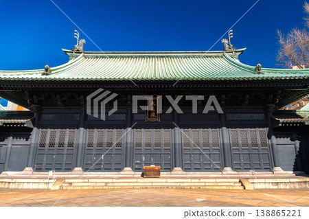 A clear blue sky and the "Taiseiden" hall of Yushima Seido in Bunkyo Ward, Tokyo. 138865221