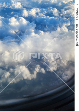 Blue sky viewing fluffy clouds from above Blue sky viewing fluffy clouds from above 138866207