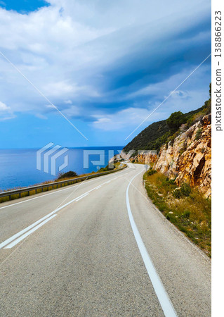 Coastal road journey with no overtaking sign Coastal road journey with no overtaking sign 138866223