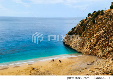 Top view of beautiful blue sea water with sand beach among mount Top view of beautiful blue sea water with sand beach among mount 138866224