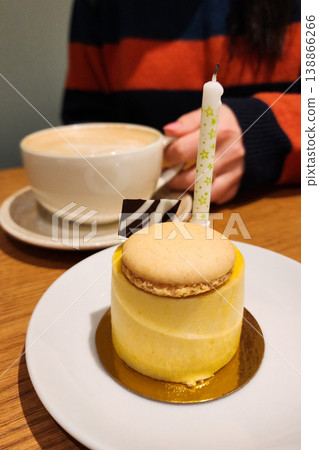 Person enjoying birthday cake and coffee celebration 138866266