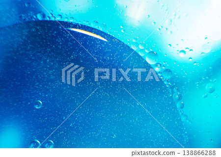 Oil bubbles close up. circles of water macro. abstract light blue background Oil bubbles close up. circles of water macro. abstract light blue background 138866288