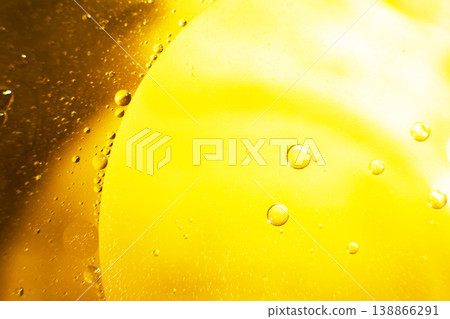 Gold Oil bubbles. circles of orange water macro. abstract yellow background Gold Oil bubbles. circles of orange water macro. abstract yellow background 138866291