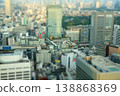 Miniature diorama-style photograph: Streetscape around Shinjuku Station bus terminal as seen from the Tokyo Metropolitan Government Building observation deck. 138868369