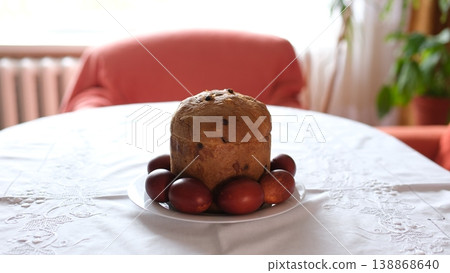 Ukrainian Easter table painted eggs panettone white tablecloth festive food tradition spring holiday 138868640