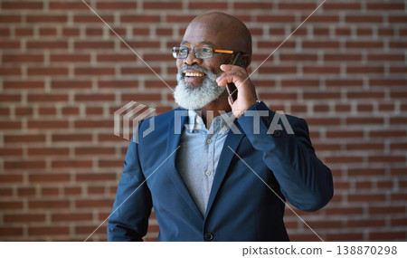 Phone call of business black man on brick wall for communication, networking success or news. Happy professional manager, senior executive or boss talking on smartphone for investment opportunity 138870298