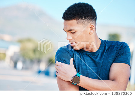 Arm pain, black man and fitness injury outdoor from sport, exercise and training. African person, athlete and mock up with a runner holding medical, sport and muscle problem after sports and workout Arm pain, black man and fitness injury outdoor from sport, exercise and training. African person, athlete and mock up with a runner holding medical, sport and muscle problem after sports and workout 138870360