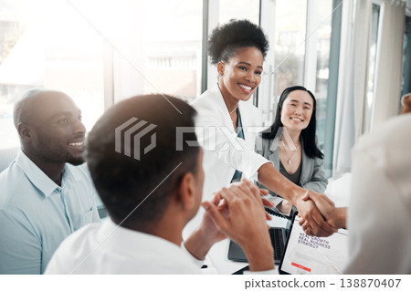 Healthcare, onboarding and handshake, doctors meeting in hospital office interview with HR recruitment agent. Diversity, human resources and black woman doctor shaking hands in welcome or thank you. Healthcare, onboarding and handshake, doctors meeting in hospital office interview with HR recruitment agent. Diversity, human resources and black woman doctor shaking hands in welcome or thank you. 138870407