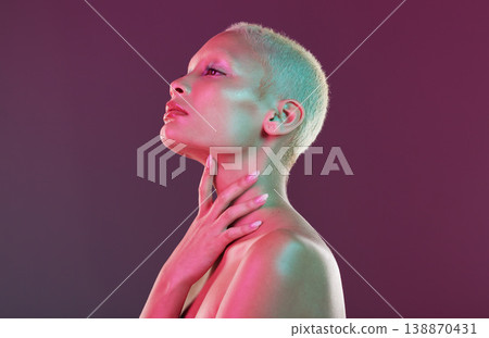 Skincare, beauty and art, woman with neon makeup and lights for creative advertising on studio background. Cyberpunk, product placement and model isolated for skin care and futuristic mock up space. Skincare, beauty and art, woman with neon makeup and lights for creative advertising on studio background. Cyberpunk, product placement and model isolated for skin care and futuristic mock up space. 138870431