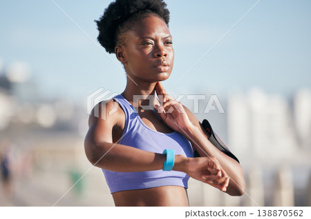Sports, workout and woman checking pulse for body wellness with smartwatch for running outdoor. Fitness, exercise and healthy African female athlete monitoring heart rate for cardio training for race 138870562