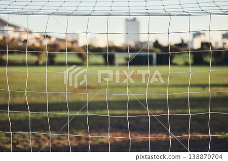 Empty, net or goal post on soccer field for fitness training, exercise or workout outdoors on grass pitch. Football club, background or closeup of game competition event or match contest in stadium 138870704