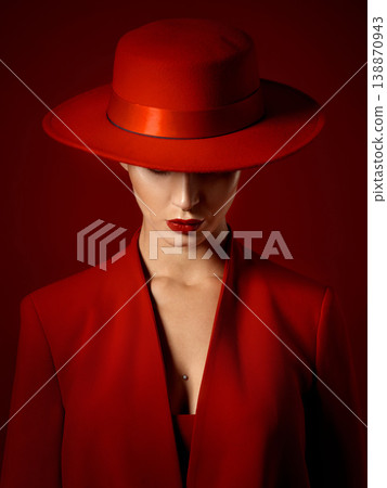 Suit, hat and woman with fashion or beauty in studio with retro, style or edgy, confident or creative pose on red background mockup. Mystery character, model and girl with power or vintage aesthetic Suit, hat and woman with fashion or beauty in studio with retro, style or edgy, confident or creative pose on red background mockup. Mystery character, model and girl with power or vintage aesthetic 138870943