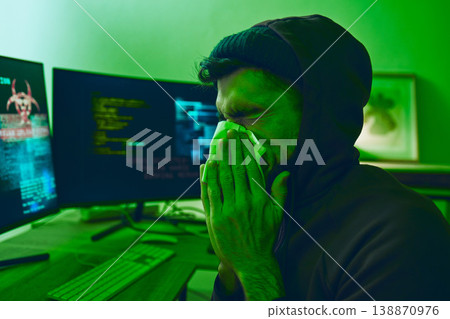 Man, crime or sick hacker with virus in office for coding, online fraud or computer cybersecurity at night. Tissue, thief or ill programmer blowing nose or working on software data scam with fever Man, crime or sick hacker with virus in office for coding, online fraud or computer cybersecurity at night. Tissue, thief or ill programmer blowing nose or working on software data scam with fever 138870976