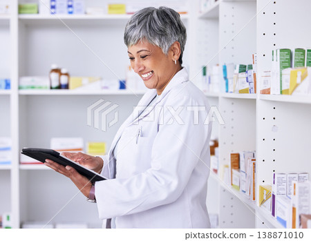 Happy woman, pharmacist and tablet for inventory inspection, stock or Telehealth at the pharmacy. Senior female person smile in medical or healthcare store for pharmaceutical checklist on technology Happy woman, pharmacist and tablet for inventory inspection, stock or Telehealth at the pharmacy. Senior female person smile in medical or healthcare store for pharmaceutical checklist on technology 138871010