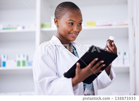 Happy black woman, pharmacist and tablet for inventory inspection or checking stock at the pharmacy. African female person in medical healthcare with pharmaceutical product or checklist on technology 138871033