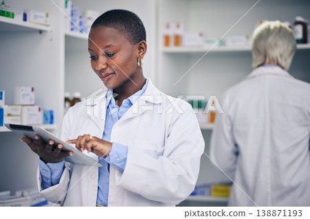 Black woman, tablet and pharmacist with checklist for stock of medicine, information and advice on drugs. Digital list, pharmacy and medical professional with online inventory for telehealth at shelf Black woman, tablet and pharmacist with checklist for stock of medicine, information and advice on drugs. Digital list, pharmacy and medical professional with online inventory for telehealth at shelf 138871193