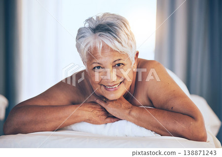 Happy senior woman, portrait and massage in relax for spa treatment, body care and physical therapy at resort. Calm elderly female person smile relaxing on salon bed for zen, stress relief or getaway Happy senior woman, portrait and massage in relax for spa treatment, body care and physical therapy at resort. Calm elderly female person smile relaxing on salon bed for zen, stress relief or getaway 138871243