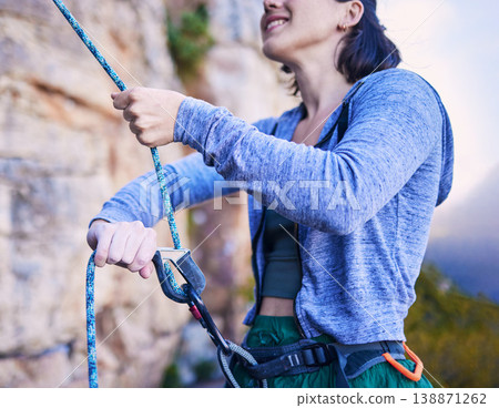 Mountain, happy and woman with rope for rock climbing adventure, freedom and extreme sports in nature. Fitness, safety and female person with equipment or gear for training, activity and challenge Mountain, happy and woman with rope for rock climbing adventure, freedom and extreme sports in nature. Fitness, safety and female person with equipment or gear for training, activity and challenge 138871262