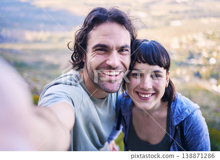 Hiking, selfie and portrait of couple in nature for adventure, holiday and journey on mountain. Travel, dating and happy man and woman take picture for social media, trekking and healthy memories Hiking, selfie and portrait of couple in nature for adventure, holiday and journey on mountain. Travel, dating and happy man and woman take picture for social media, trekking and healthy memories 138871286