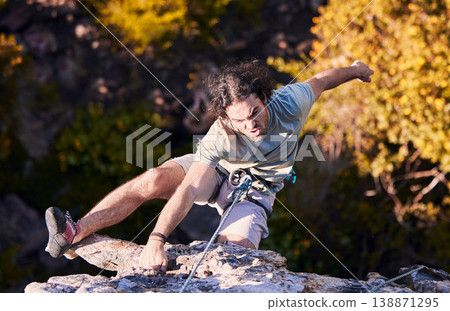 Adventure, grab and sports, man rock climbing on mountain with cable for support and safety. Extreme workout, challenge and courage, climber on cliff with rope, commitment and fitness in nature. Adventure, grab and sports, man rock climbing on mountain with cable for support and safety. Extreme workout, challenge and courage, climber on cliff with rope, commitment and fitness in nature. 138871295