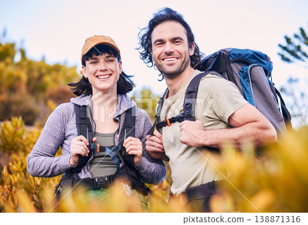 Hiking, fitness and portrait of couple in nature for adventure, holiday and journey on mountain. Travel, dating and happy man and woman walking to explore, trekking and backpack outdoors for wellness Hiking, fitness and portrait of couple in nature for adventure, holiday and journey on mountain. Travel, dating and happy man and woman walking to explore, trekking and backpack outdoors for wellness 138871316