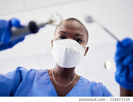 Pov, woman or dentist working with tools to clean teeth in consultation, orthodontics or dentistry clinic or medical surgery. Healthcare, nurse and mask in procedure, test tooth or dental care Pov, woman or dentist working with tools to clean teeth in consultation, orthodontics or dentistry clinic or medical surgery. Healthcare, nurse and mask in procedure, test tooth or dental care 138871530